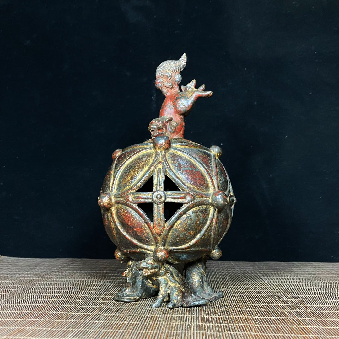 Ancient Precious Antique: Handcrafted Hollow Incense Burner with Lion Rolling Ball Design