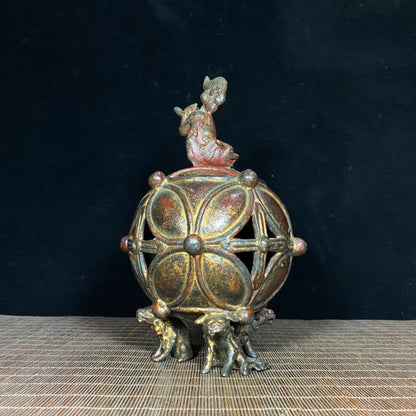 Ancient Precious Antique: Handcrafted Hollow Incense Burner with Lion Rolling Ball Design