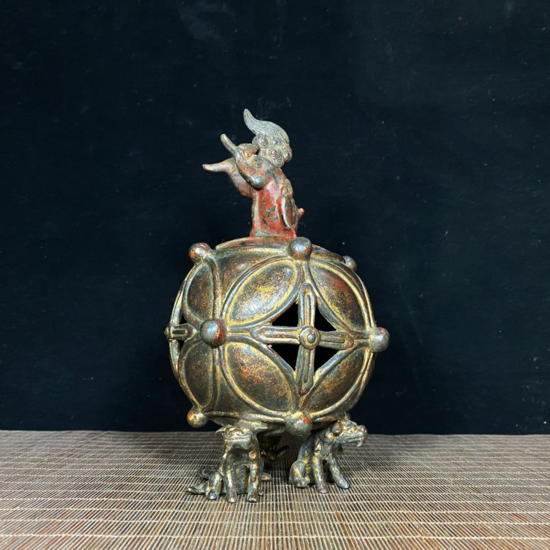 Ancient Precious Antique: Handcrafted Hollow Incense Burner with Lion Rolling Ball Design