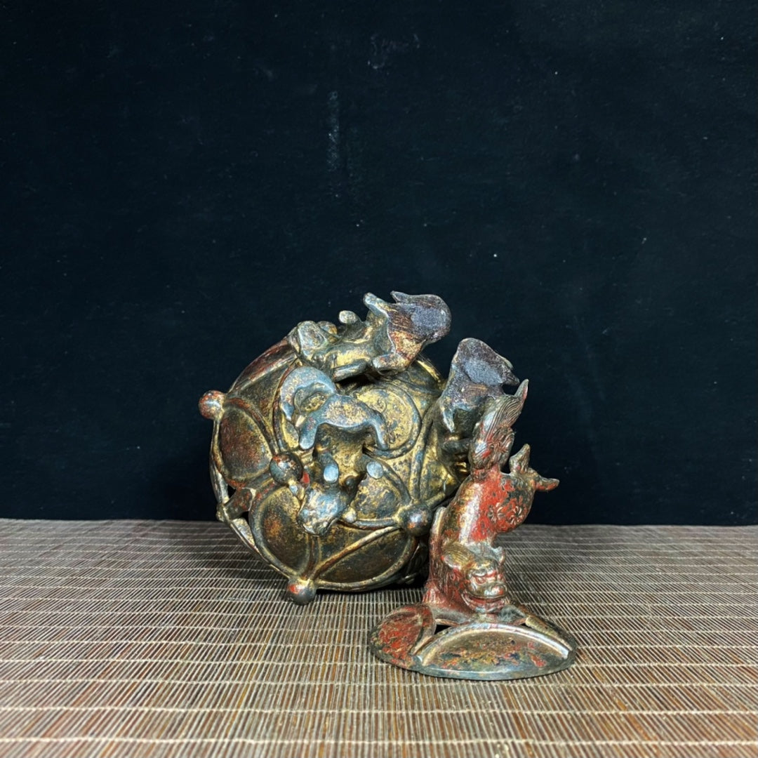 Ancient Precious Antique: Handcrafted Hollow Incense Burner with Lion Rolling Ball Design