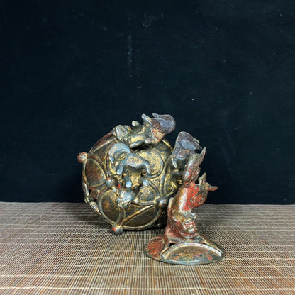 Ancient Precious Antique: Handcrafted Hollow Incense Burner with Lion Rolling Ball Design