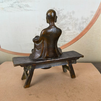 Handcrafted Monk Sculpture Sitting on Bench - Exquisite Artwork, Unique Gift, Rare Collectible