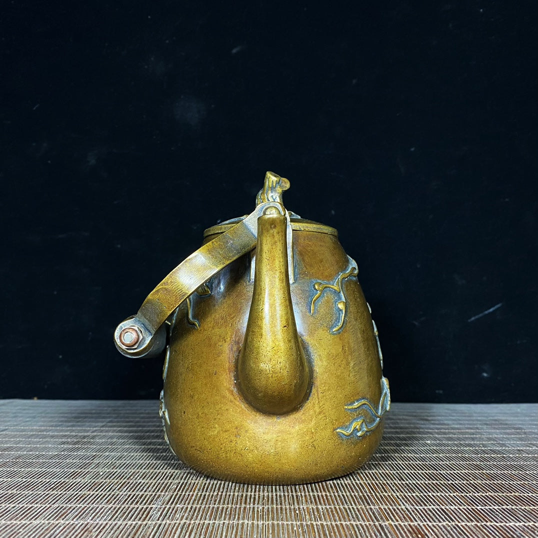 Exquisite Copper Relief Teapot with Wooden Handle - Handcrafted Masterpiece for Collectors and Decor Enthusiasts